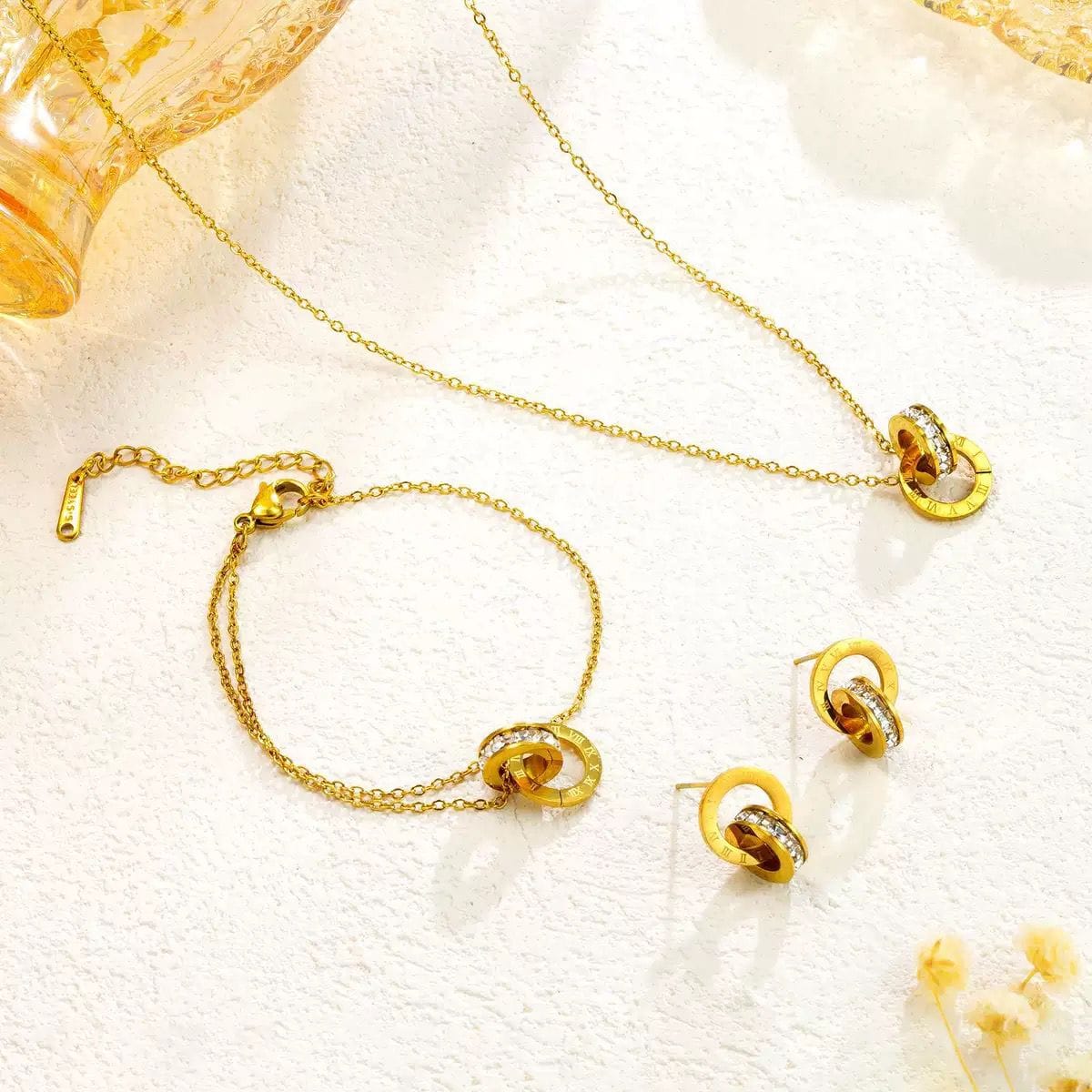 Roman Numeral Interlocking Ring Jewellery Set – Necklace, Bracelet & Earrings | طقم مجوهرات الحلقات الرومانية